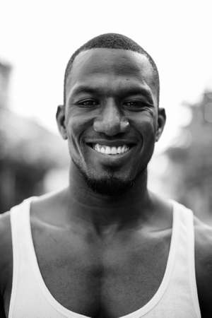 Handsome muscular African man in the streets outdoorsの写真素材
