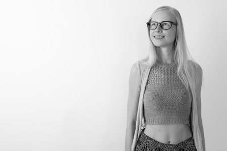 Beautiful blond woman against white backgroundの写真素材