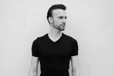 Black and white portrait of handsome Italian man thinkingの写真素材