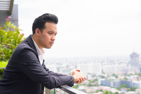 Portrait of man Asian businessman wearing suit in Bangkok, Thailandの写真素材