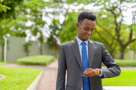 Portrait of handsome young African businessman wearing suit and tieの写真素材