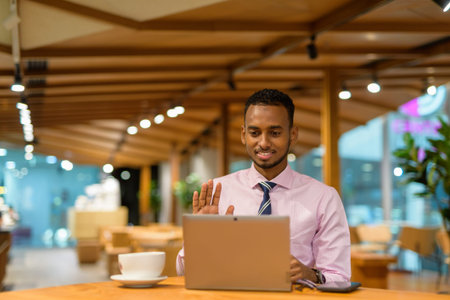 Portrait of professional young African businessman