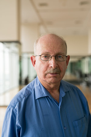 Portrait of senior businessman looking at camera