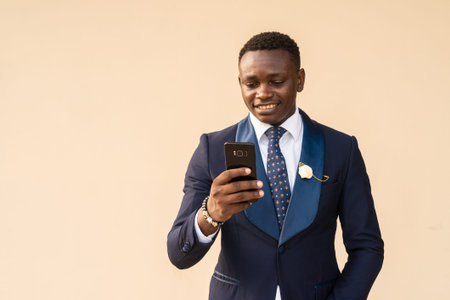 Portrait of handsome young African man wearing suitの写真素材