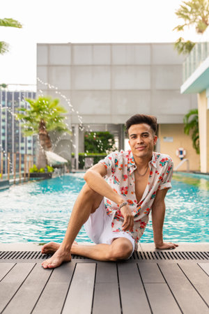 Portrait of handsome young cool stylish man during summer