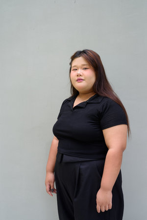 Portrait of Asian cute teenager girl posingの写真素材