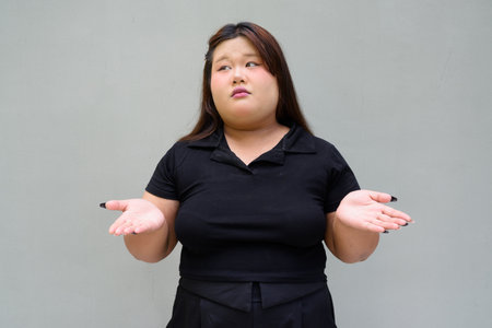 Portrait of Asian cute teenager girl posingの写真素材