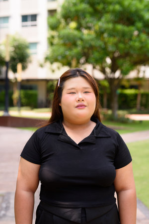 Portrait of Asian cute teenager girl posingの写真素材