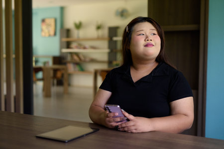 Portrait of Asian cute teenager girl posingの写真素材