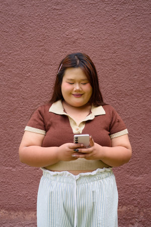 Portrait of Asian cute teenager girl posingの写真素材