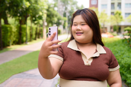 Portrait of Asian cute teenager girl posingの写真素材