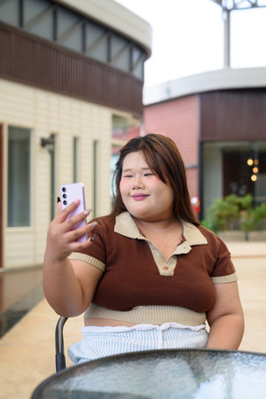 Portrait of Asian cute teenager girl posingの写真素材