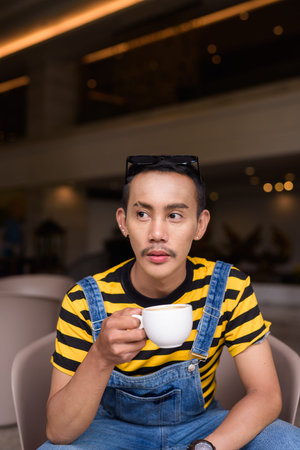Portrait of nonbinary genderfluid young Asian gay man