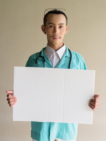 Portrait of non binary gay man doctorの写真素材