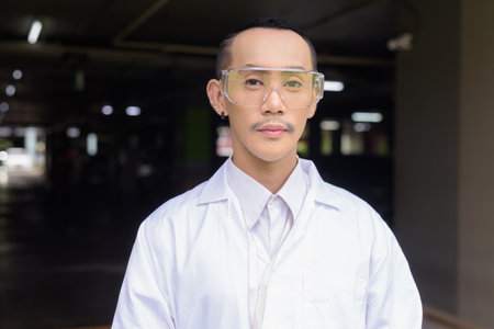 Portrait of non binary gay man research scientistの写真素材