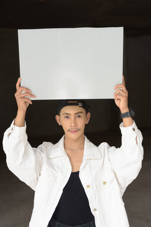 Portrait of non binary young handsome gay manの写真素材