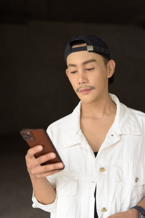 Portrait of non binary young handsome gay manの写真素材