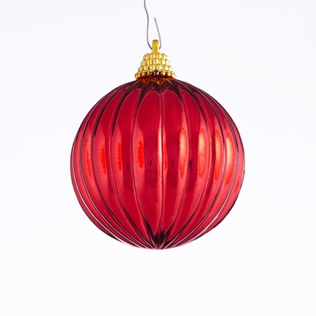 A red Christmas ball ornament isolated against a white background in the Square format.の写真素材