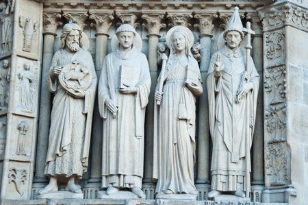 Sculptures on fasade of The Notre Dame de Paris. France.の写真素材