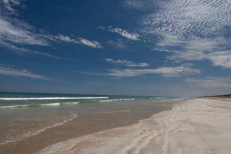 Lonely beach close to Adelaide, big round rocks in the waterの写真素材