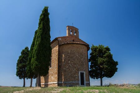 Chapel with cypresses Santa Maria di Vitaleta - Tuscany, Italyの写真素材