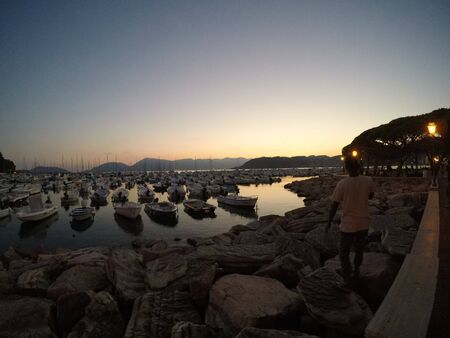Sunset in the port - Lerici, Liguria, Italyの写真素材