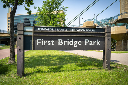 Sign for the First Bridge Park, located in downtown Minneapolis Minnesotaのeditorial素材