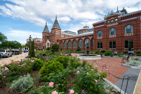 Washington, DC - May 9, 2019: Exterior of the Smithsonian Castle, with a rose garden and patio on the National Mallのeditorial素材
