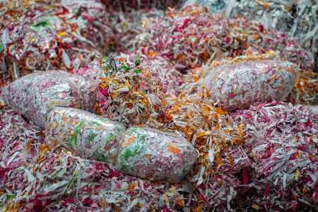 Colorful shredded paper in bunches and bundles, used for packaging materials for fragile itemsの写真素材