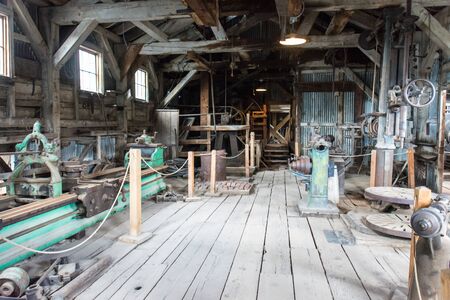 Inside the old gold mining mill in the abandoned ghost town of Bodie, California, at Bodie State Historic Parkの写真素材