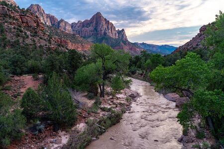 View of The Watchman rock formation along the Virgin River in Utahâs Zion National Parkの写真素材