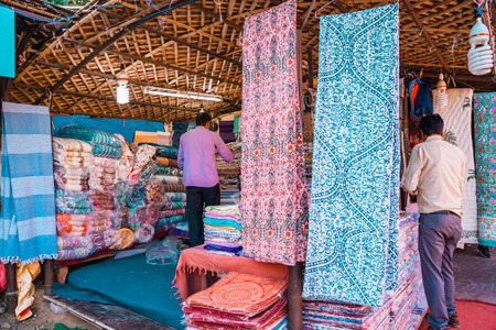 New Delhi, India - November 17, 2019: Rugs sold at a booth in Dilli Haat, an outdoor craft market bazaar showcasing handmade items from each Indian stateのeditorial素材
