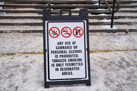 Sign prohibiting the use of cannabis, alcohol and tobacco smoking. Winter scene with snowの写真素材