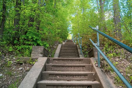 Red Wing, Minnesota - May 25, 2019: Kiwanis Stairway, with names imprinted into the steps along the Barn Bluff trailの写真素材