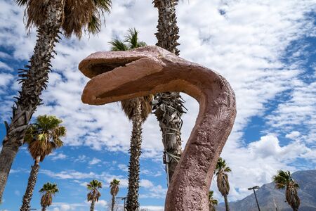 March 20, 2019 - Cabazon, California: The Cabazon Dinosaurs roadside attraction off of the I-10 freeway on a partly cloudy dayのeditorial素材