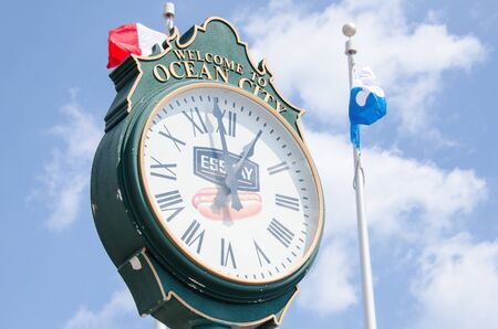 Ocean City, Maryland - April 3, 2018: Classic analog clock on the Ocean City boardwalk gives visitors the timeのeditorial素材