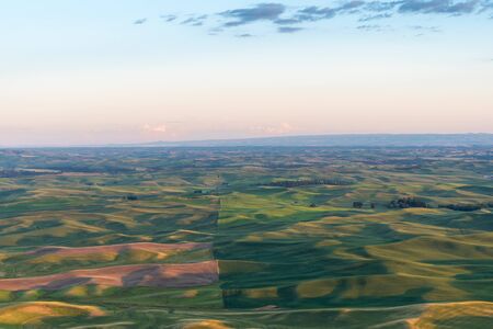 Beautiful sunset golden hour view of the Palouse as seen from Steptoe Butte State Park in Washington State USAの写真素材