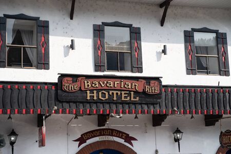 Leavenworth, Washington - July 4, 2019: Exterior sign for the Bavarian Hotel Ritz in the German Bavarian themed townのeditorial素材