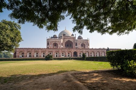 Humayans Tomb as seen framed by trees in New Delhi Indiaのeditorial素材