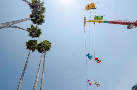 Skyride on the Santa Cruz boardwalk, looking up against the skyの写真素材