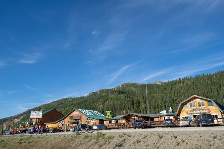 AUGUST 12 2018 - DENALI NATIONAL PARK, ALASKA: View of the row of gift shops, restaurants and tourist guide services outside of Denali National Park in an area known to locals as "Glitter Gulch."のeditorial素材
