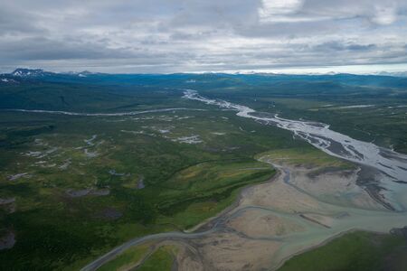 Beautiful aerial view of Katmai National Park. Braided river and untouched wilderness, and mountains in Alaskaの写真素材