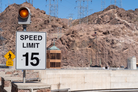 Sign for Speed Limit 15 at the Hoover Dam on a sunny dayのeditorial素材