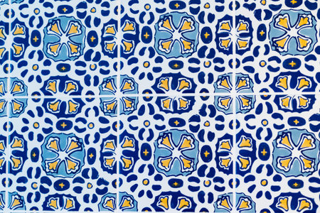Mosaic of traditional Portugal tiles (azulejo) in blue, yellow and white colorsの写真素材