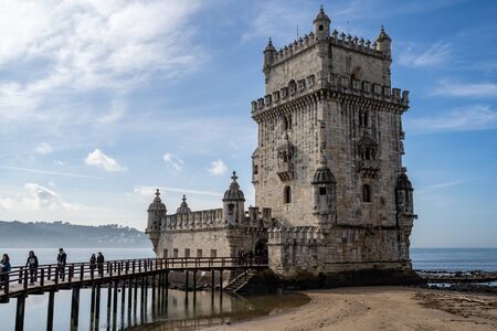 Lisbon, Portugal - January 17, 2020: Tourists visit Belem Tower, a UNESCO World Heritage Site and fortのeditorial素材