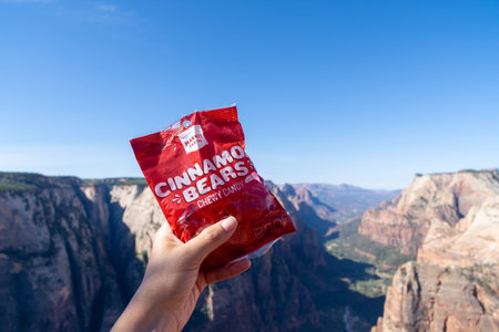 JULY 17 2018 - SPRINGDALE UTAH: Female hand holds up a package of Target's Market Pantry gummy...