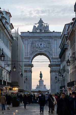Lisbon, Portugal - January 17, 2020: Arco da Rua Augusta framed with tourists enjoying the view from PraÃ§a do ComÃ©rcioのeditorial素材