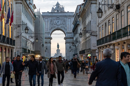 Lisbon, Portugal - January 17, 2020: Arco da Rua Augusta framed with tourists enjoying the view from...
