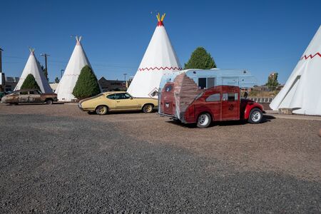 JULY 2 2018 - HOLBROOK ARIZONA: The famous Route 66 landmark - the Wigwam Motel offers hotel guests to sleep in a concrete wigwam structure. Vintage cars add to the nostalgic charmのeditorial素材