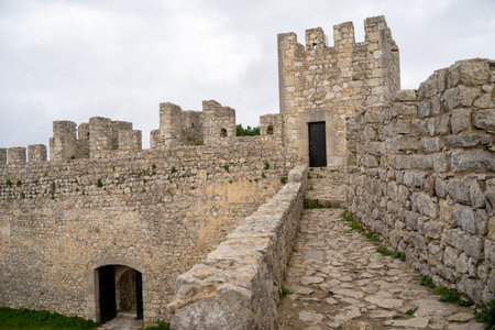 Sesimbra, Portugal - January 24, 2020: View of the interior ruins of Sesimbra Castle on an overcast...